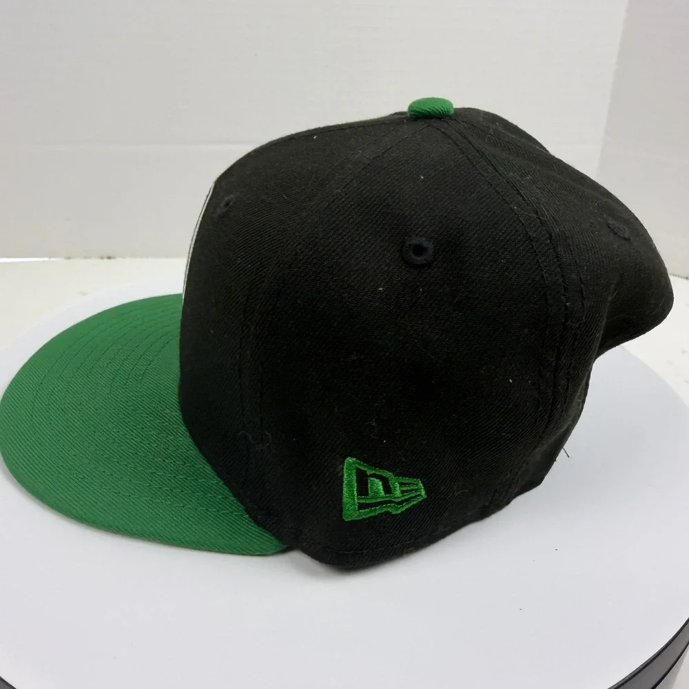 New Era 9FIFTY Boston Celtics Youth Snapback Hat Black Green NBA Cap Logo Patch